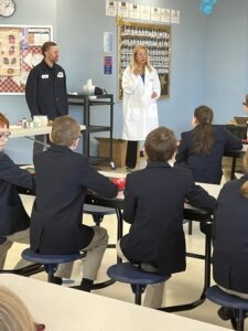 Scientists from Chemical company BASF teach Ivywood Classical Academy students about chemical reactions in the classroom